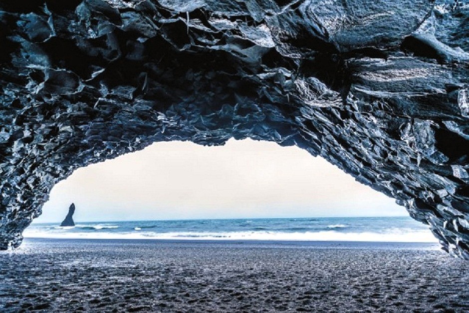 A photo feature for a newspaper by renowned Photographer Sharad Haksar. Seen in this pic is an image from Iceland, captioned The Cave With A View. 